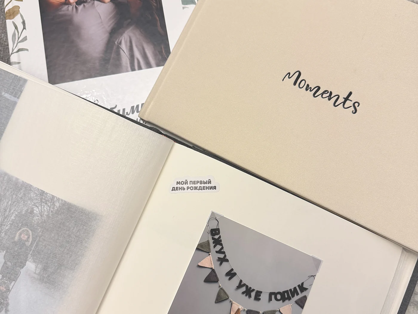 Фотокниги в тканевых обложках: «Moments» и детская книга с растительным узором